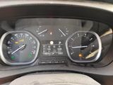 a close up of a car dashboard with a speedometer and gauges
