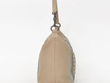 a beige purse with a zipper on the front and a zipper on the back