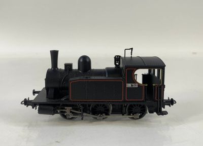 a toy train that is sitting on a white surface
