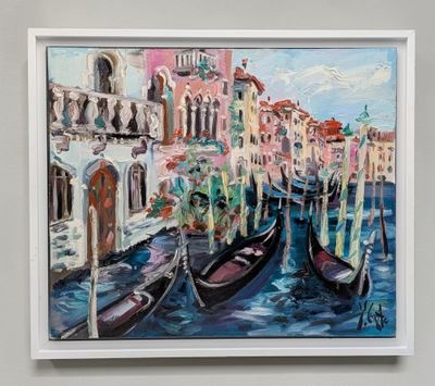 painting of gondolas in venice, italy in a white frame on a wall