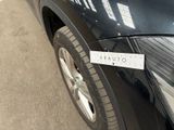 a picture of a car with a sticker on the side of it