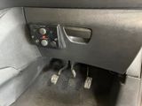 a picture of a car dashboard with buttons and controls