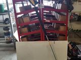 a picture of a rack of tools in a garage