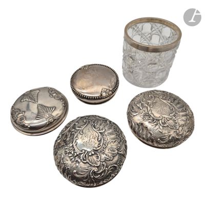 several silver objects are sitting on a white surface