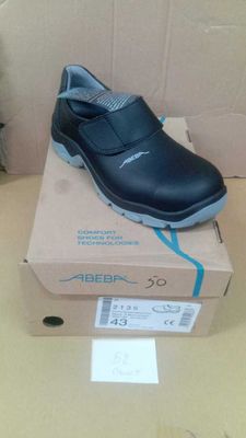 a shoe that is on top of a box