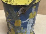 a bucket with a handle that is sitting on a table