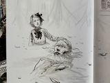 an open book with a drawing of a girl and a dog