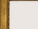 an antique gold frame with a decorative pattern on it