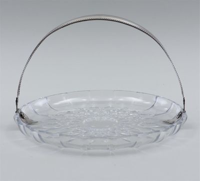a clear glass basket with a handle and a metal handle