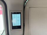 a cell phone in the back seat of a car