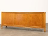 a wooden cabinet with two doors and two drawers