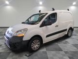 a picture of a white van parked on a checkered floor