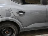 a car that is parked on the side of the street