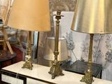 two lamps that are on a table in a room