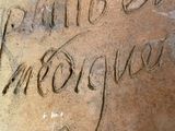 a stone that has writing on it that says