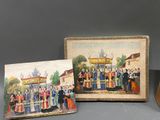 three miniature paintings of people are displayed in front of a wooden frame