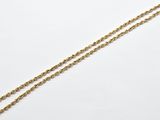 a gold necklace with a chain that is attached to it