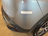 a close up of a car with a sticker on it