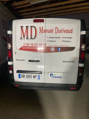 a van that is parked in a garage with the door open