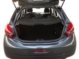 the back end of a car with the trunk open and the back seats down