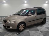 a picture of a small car parked in a garage