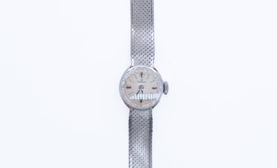 a watch that is sitting on top of a table