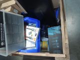 a box with some items in it sitting on a pallet