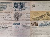 several different types of bank notes are on display on a table