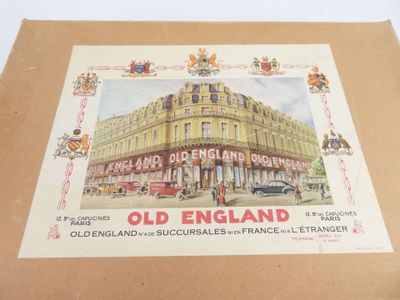 la photo d'une vieille carte postale d'Angleterre posée sur une table