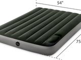 an inflatable air mattress with a built in pump