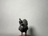 bronze figurine of a turkey on a marble base