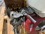 a close up view of a small engine on a pallet