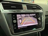a picture of a car ' s dashboard with a camera attached to it