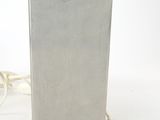 a lamp that is sitting on a table with a cord
