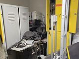 yellow lockers in a room filled with assorted items