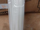 a stack of white plastic straws sitting on a cardboard box