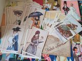 a lot of cards on the table with pictures on them