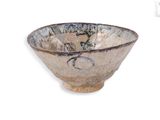 a small bowl with a design on the inside