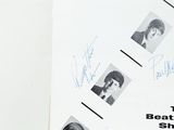 a book with a picture of the beatles on it