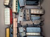 a box full of different types of toy trains in it