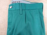 a close up of a pair of green pants on a table