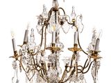 an image of a chandelier made of glass and brass