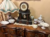 a wooden table with a clock on top of it