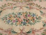 a large rug with a floral design on it