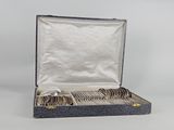 a set of six silverplated flatware in a case