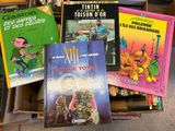 a lot of books that are sitting in a box