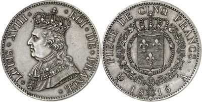 a close up of a coin with a crown on top of it