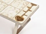 a coffee table with a cross on the top of it