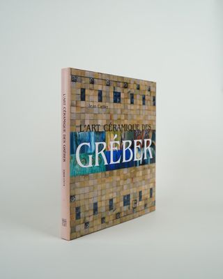 a book that is sitting on a white table