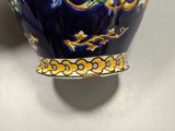 an image of a close up of a vase on a table